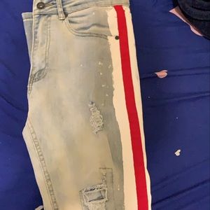 Res Carpet Blue Ripped Jeans With Red Stripe